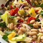 Mediterranean antipasto salad with white beans, artichoke hearts