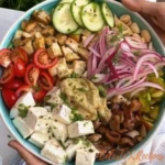 Mediterranean Chicken Salad with fresh vegetables and feta