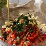 Mediterranean cucumber salad with feta cheese, tomatoes, and fresh herbs